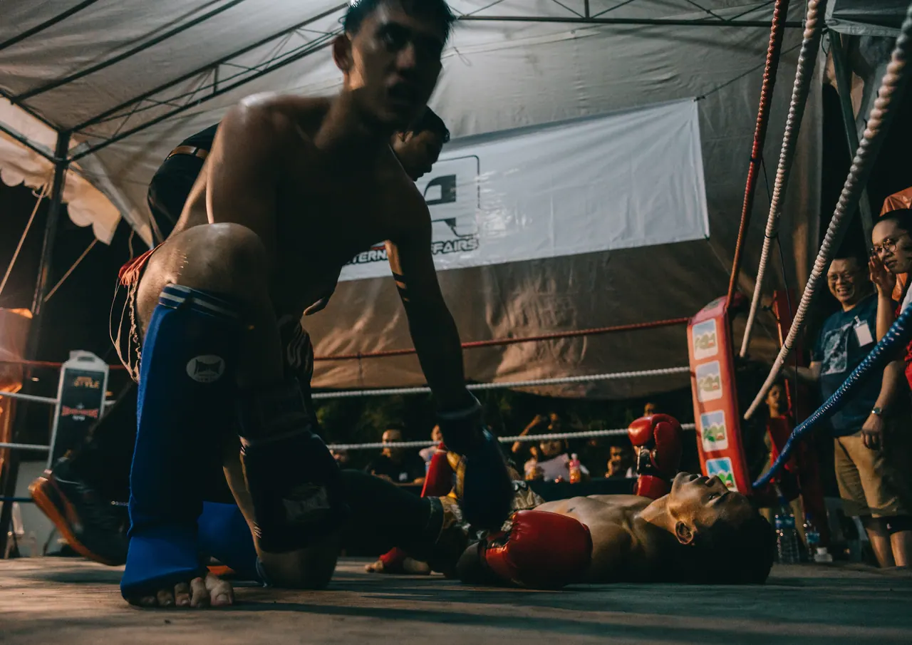 A fighter goes down on the canvas.