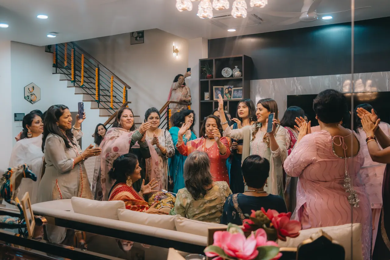 A full room of guests dancing.